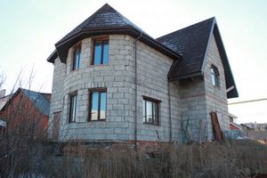 Отделка фасада дома из шлакоблока плитами Полифасад полифасад для отделки шлакоблочных домов